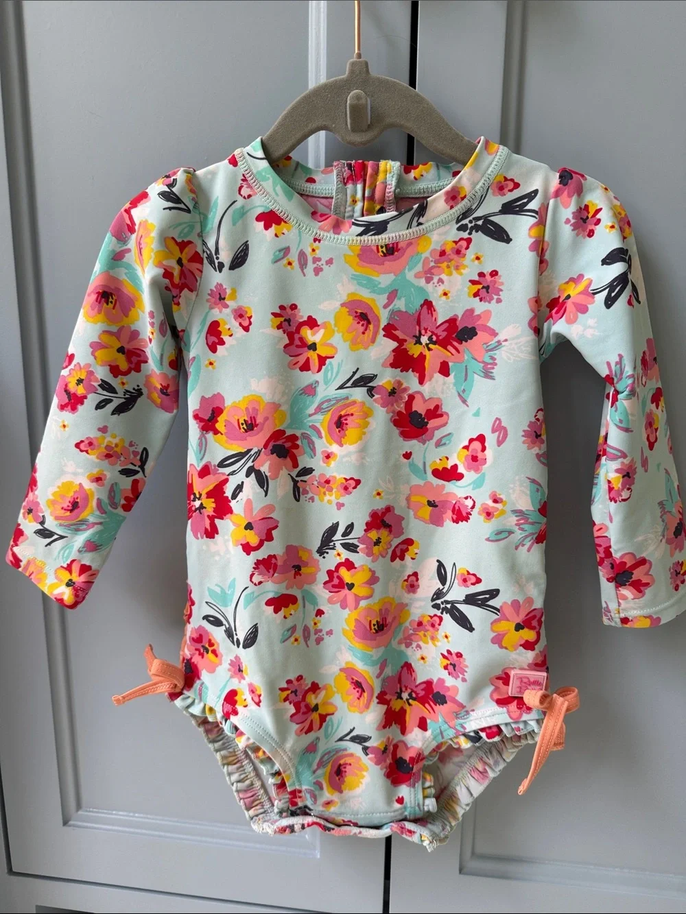 Ruffle Butts Aqua Floral Long-Sleeve Swim One-Piece with Pink and Yellow Flowers